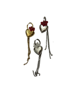 Mono earring with heart and small flower