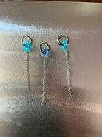 Mono earring with small flower and chains